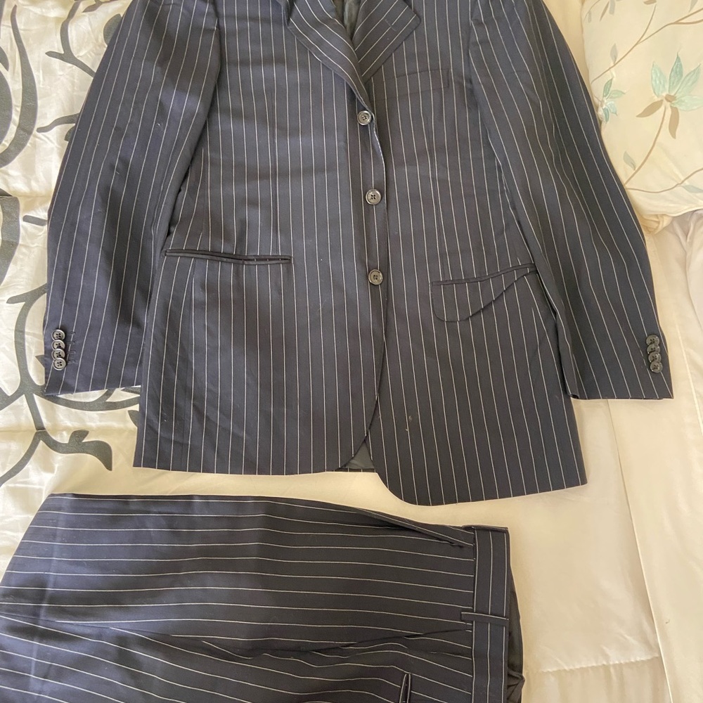 Corneliani suit for sale, a true wardrobe staple. Set size 48